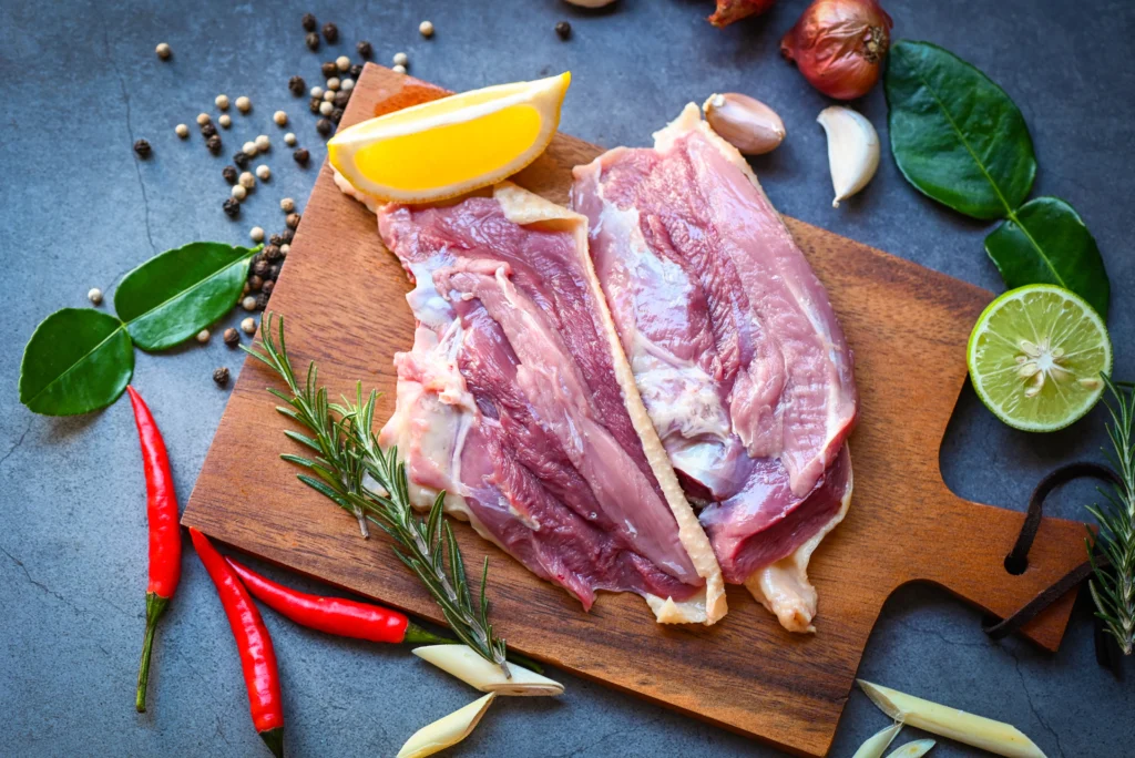 vecteezy raw duck breast with herb spices ready to cook on wooden 8066861 www.moroccaneats.com